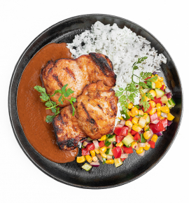 Grilled chicken with Mole sauce and vegetable salsa