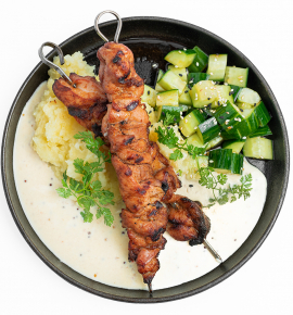 Grilled chicken skewers with spicy cucumber, mustard and Chipotle sauce