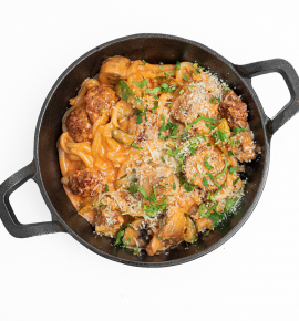 Udon noodles with pork meatballs, mushrooms, and peppers